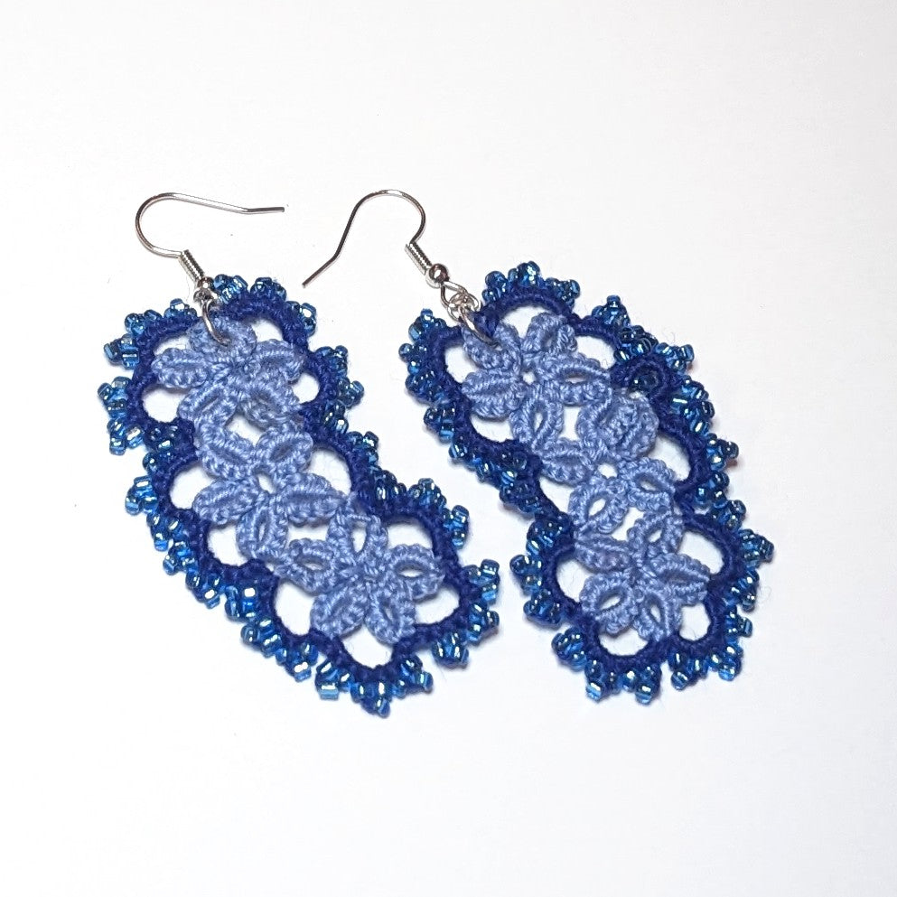 3 Blues Jellybean Earrings on white background