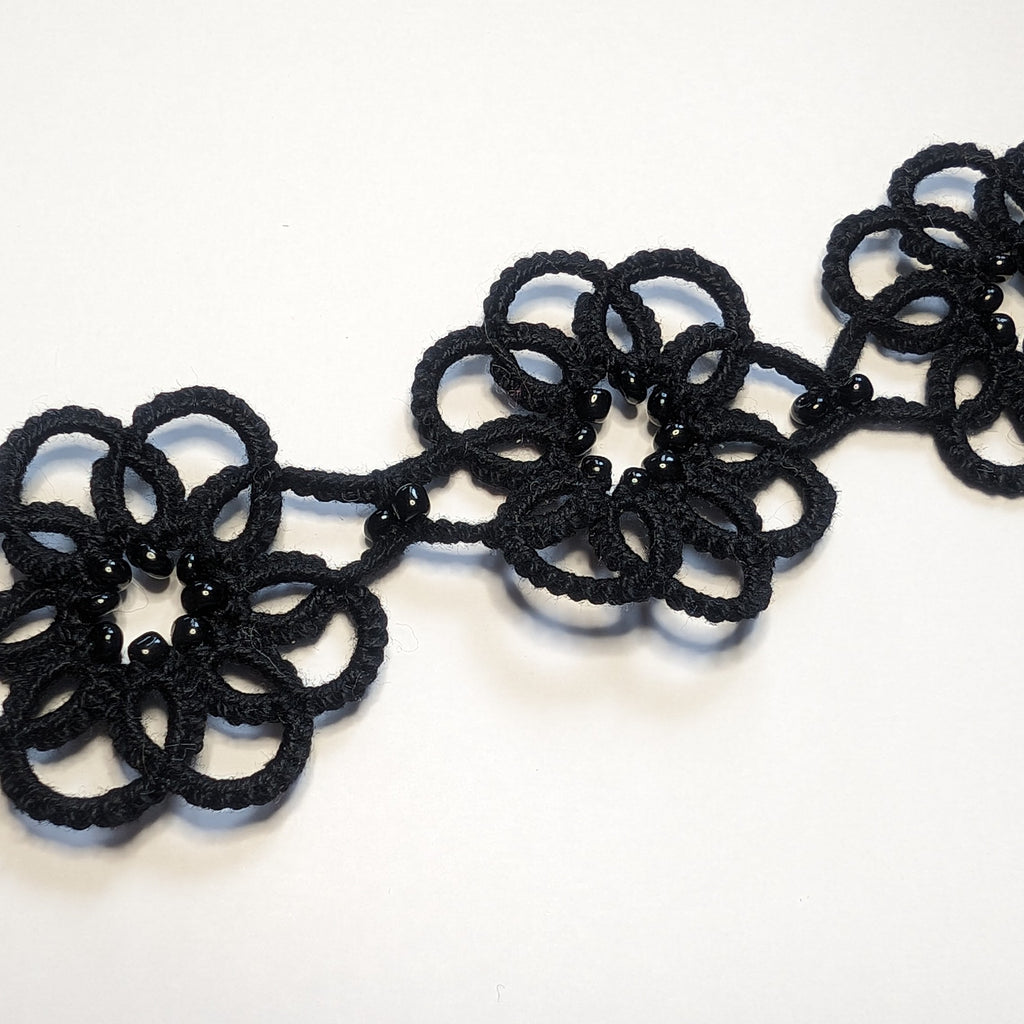 All Black Clematis Bracelet on White Background