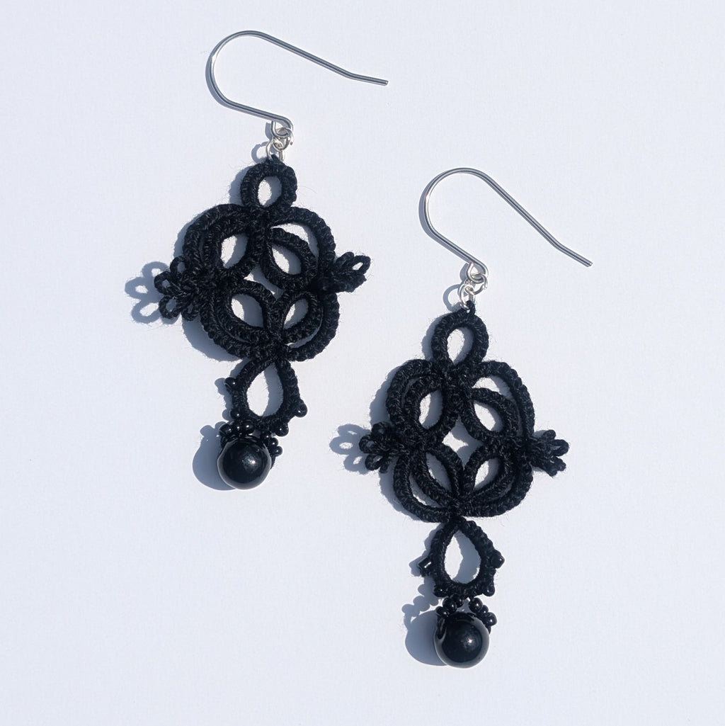 All Black Quadrille Earrings on White Background