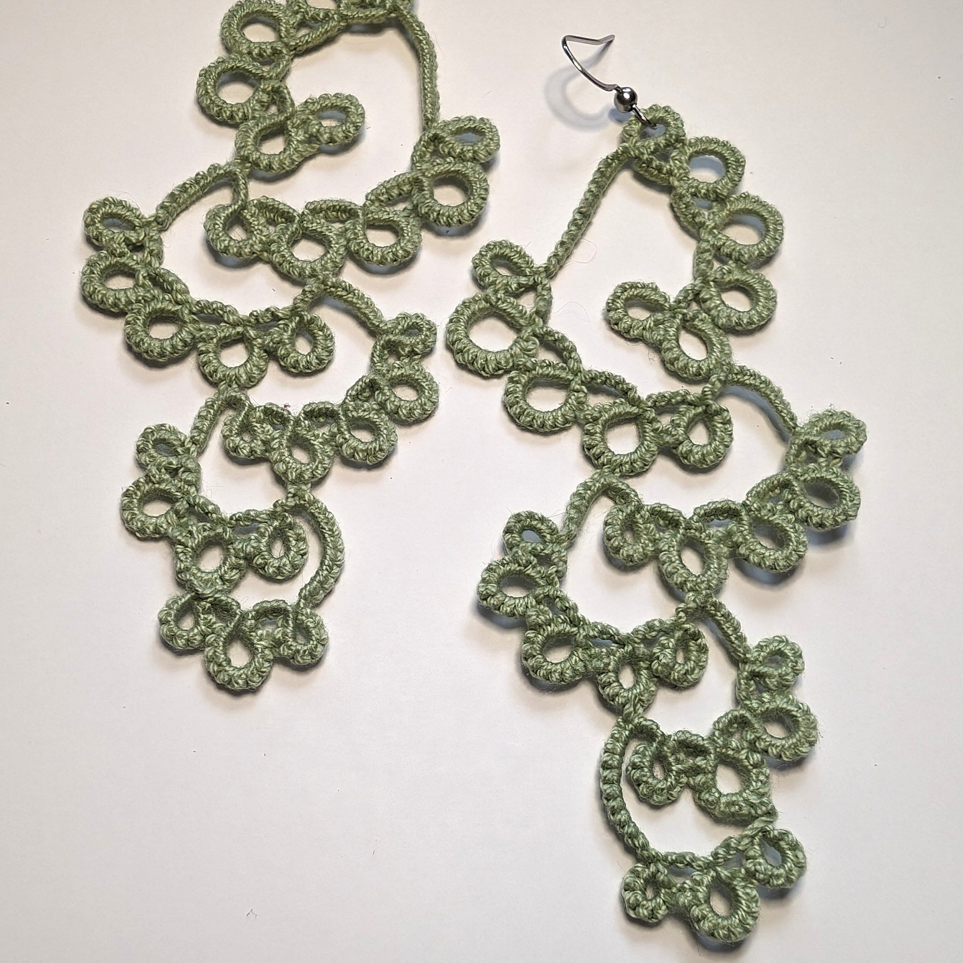All Sage Green Drifting Bubbles Earrings on White Background