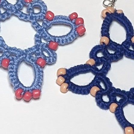 Blues Coral Peach Starburst Earrings closeup on white background