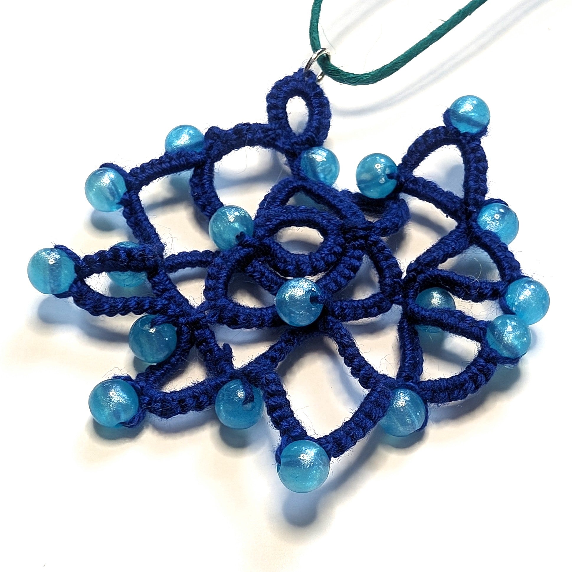 Blues Green Rose Necklace on White Background