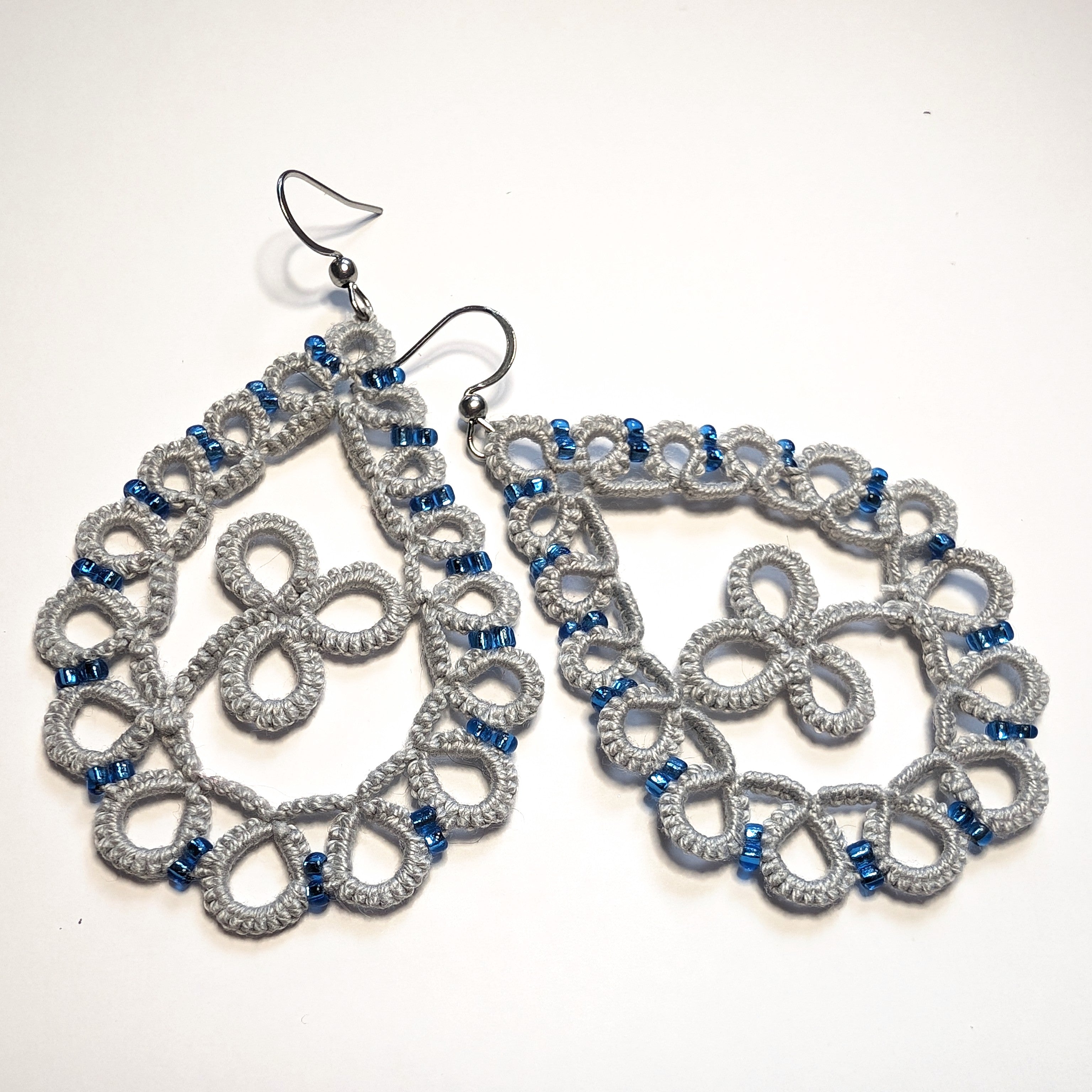 Gray Blue Clover Drop Earrings on White Background