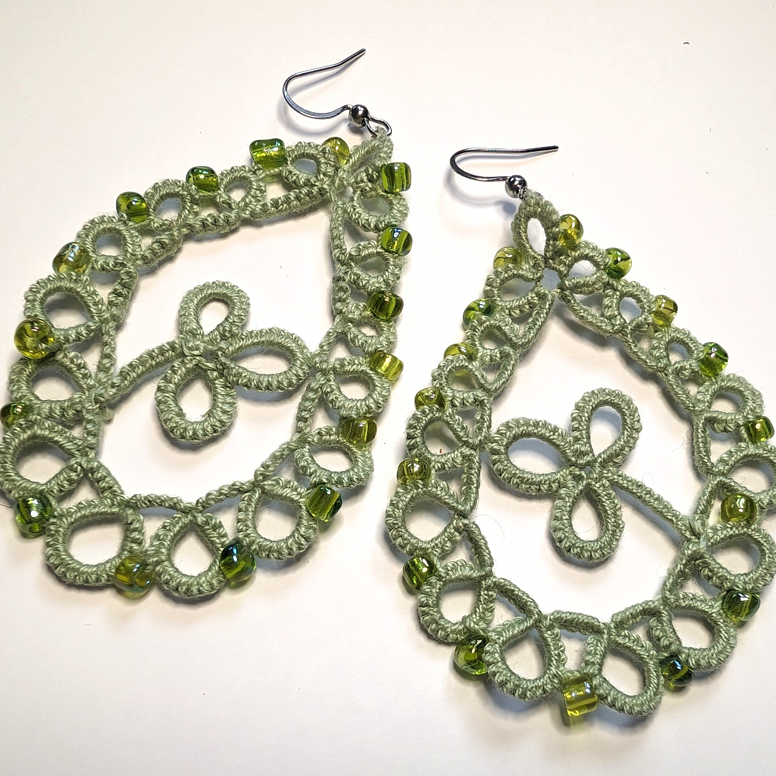 Greens Clover Drop Earrings on White Background