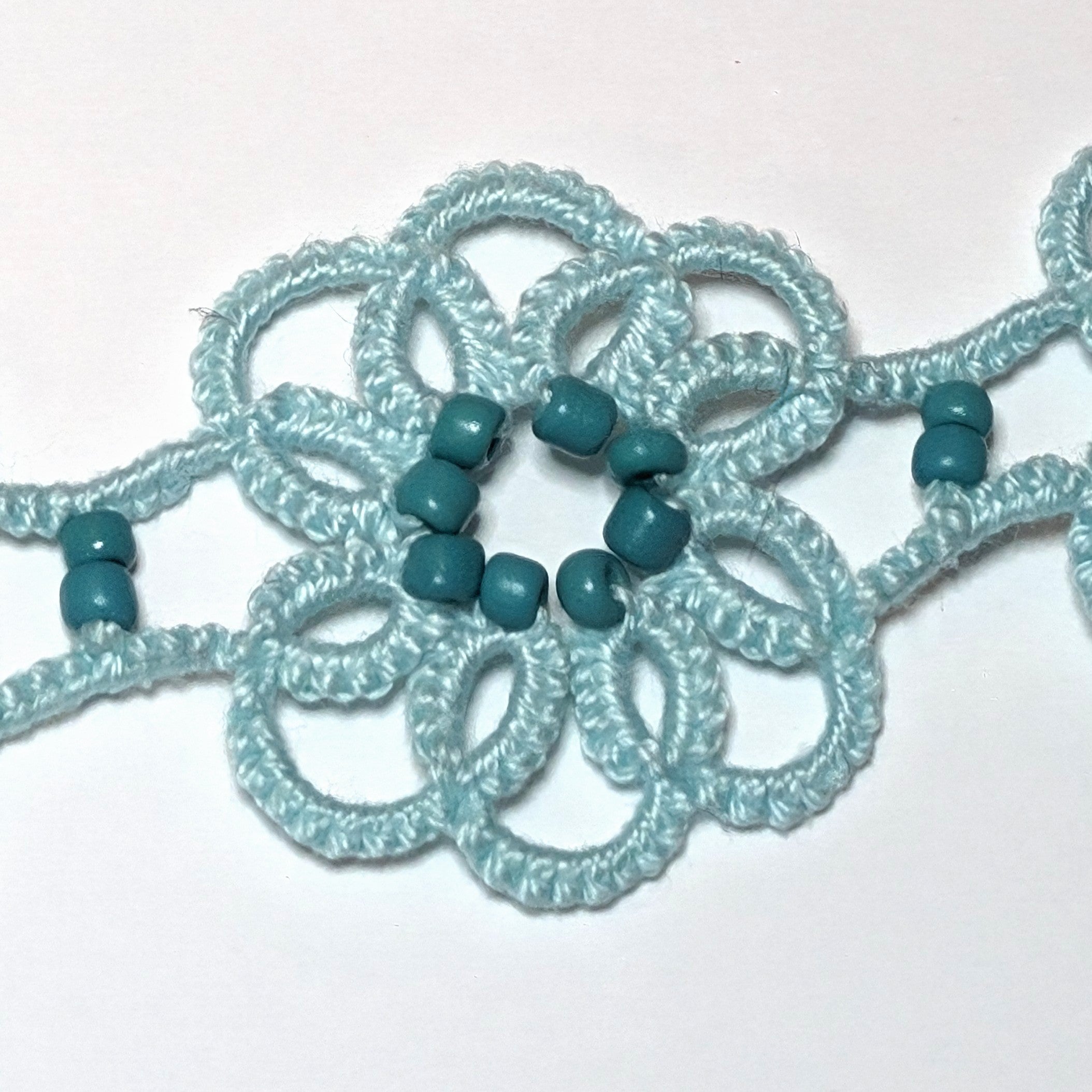 Icy Mint Med Green Clematis Bracelet Closeup on white background