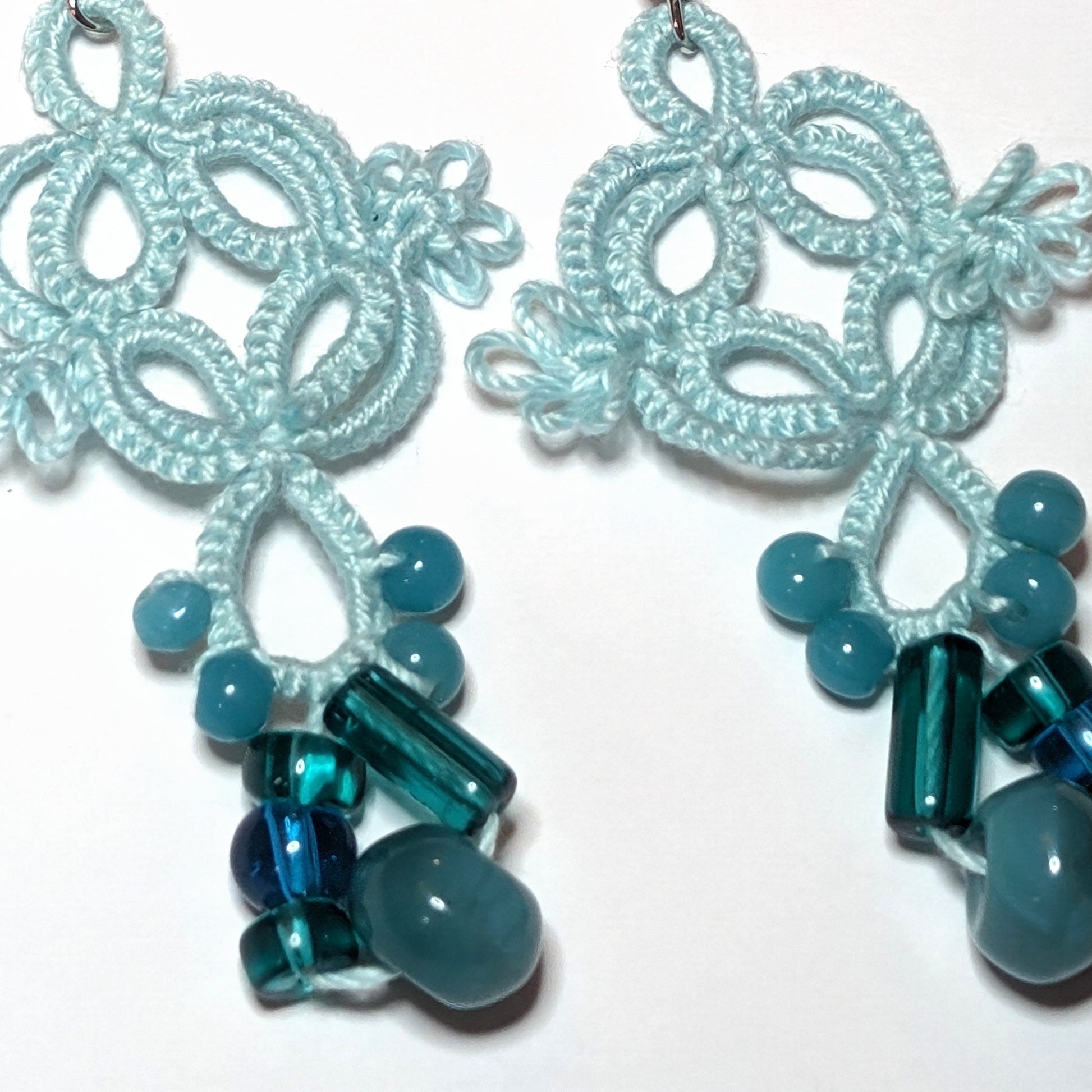 Icy Mint Teal Quadrille Earrings Closeup on white background