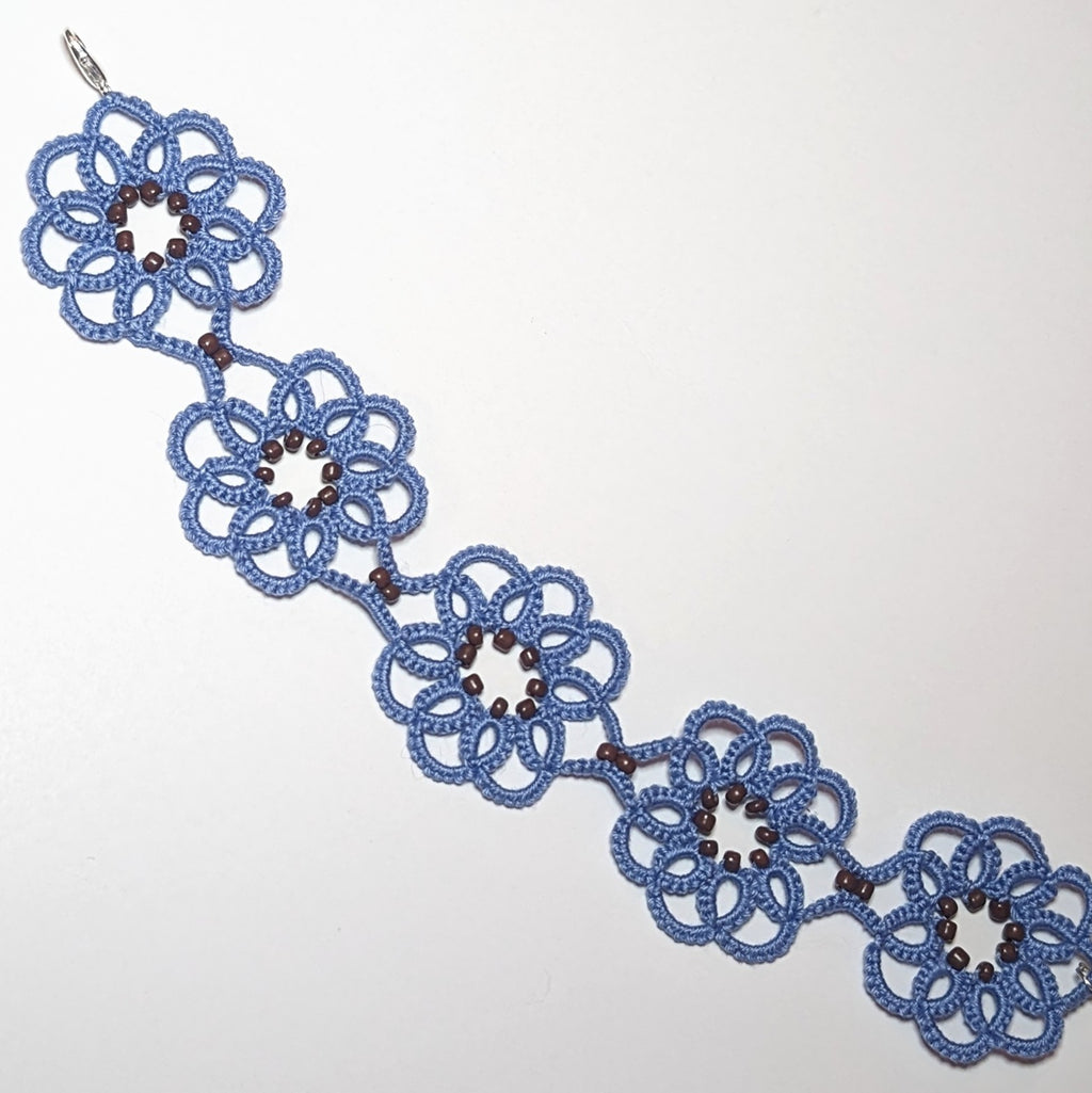 Light Blue Brown Clematis Bracelet on white background