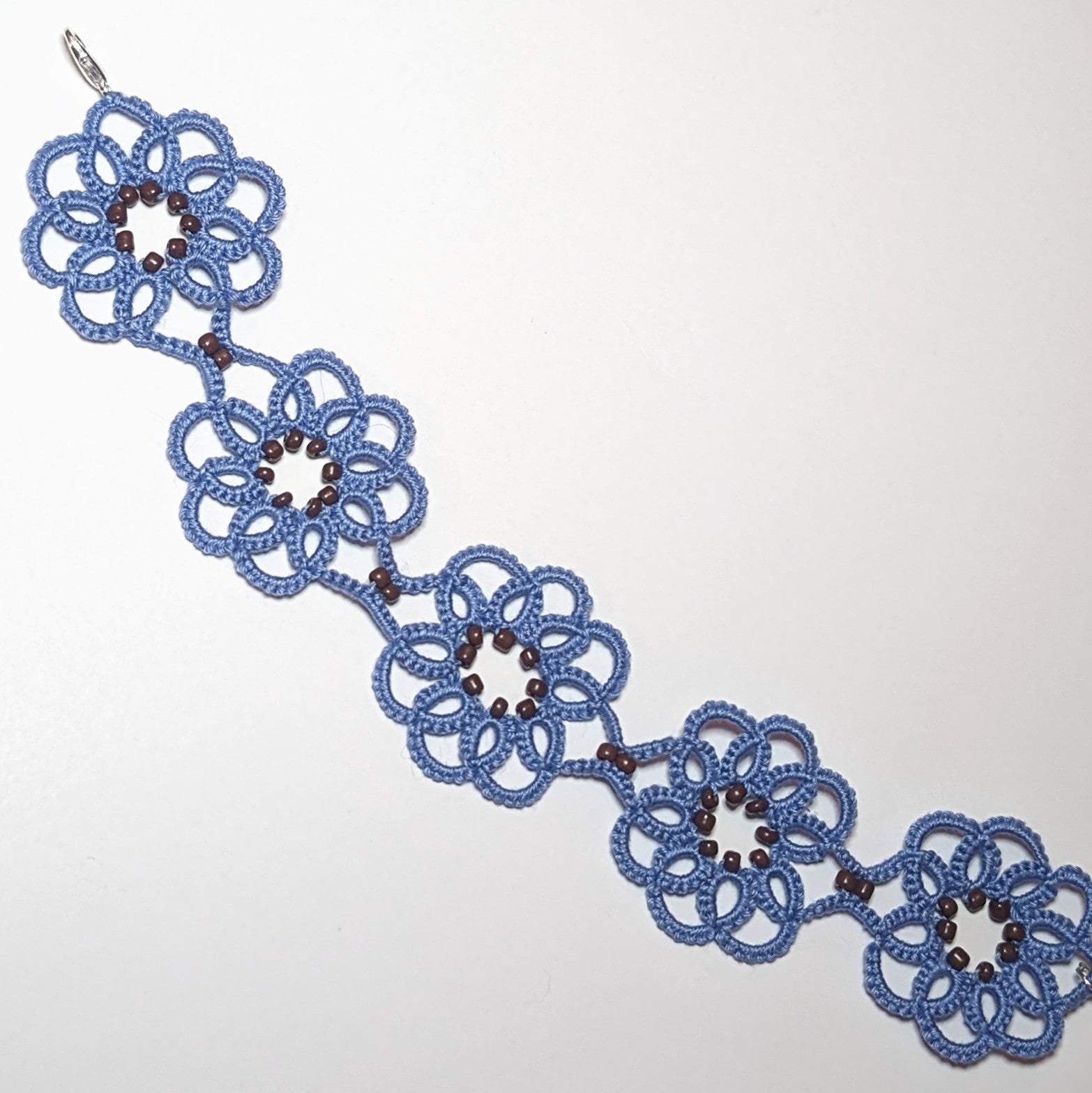 Light Blue Brown Clematis Bracelet on white background