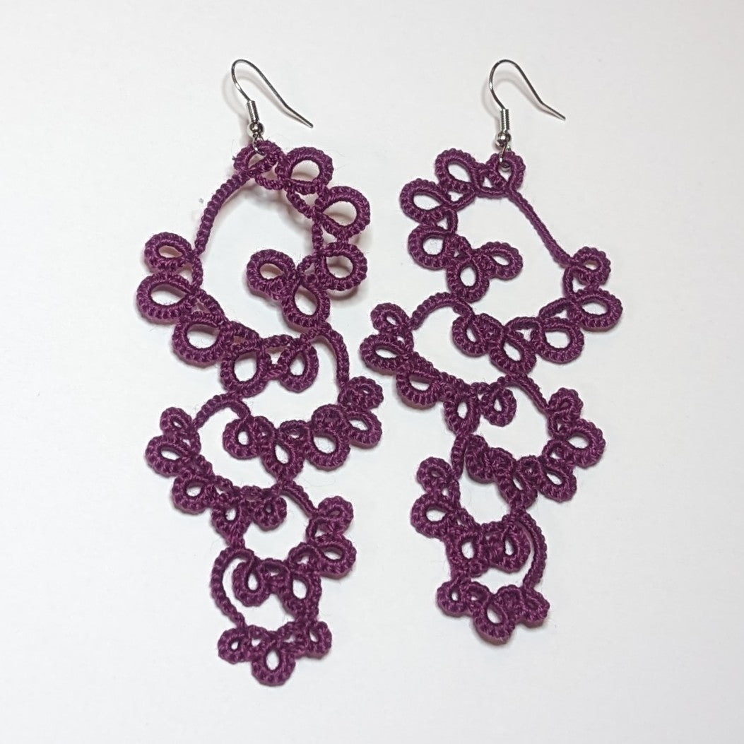 Plum Drifting Bubbles Earrings on white background