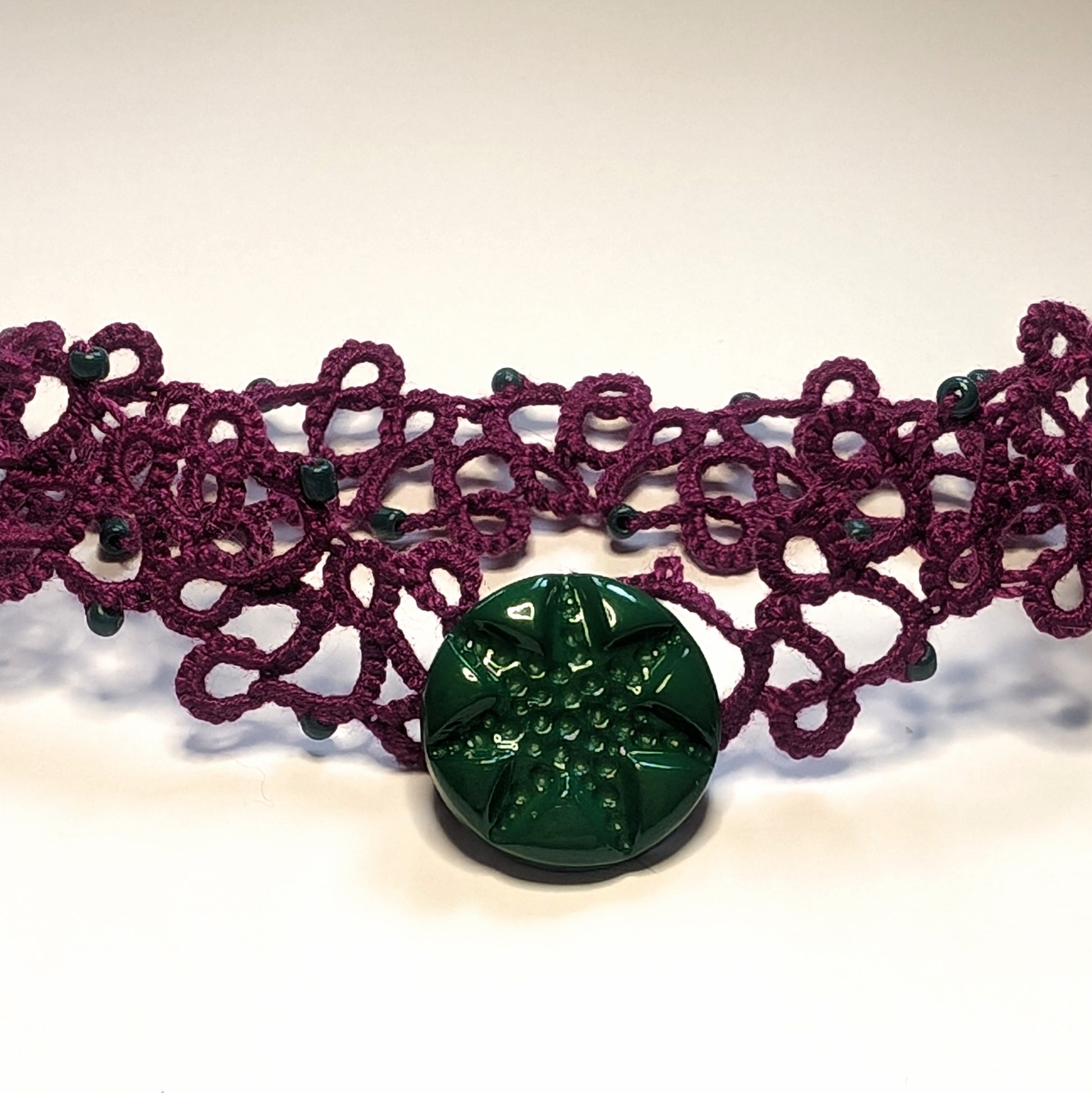 Plum Greens Modern Filigree Bracelet on White Background