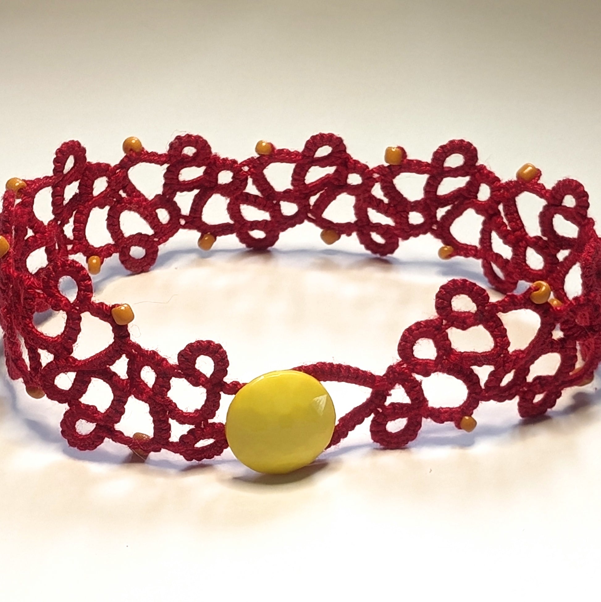 Red Goldenrod Yellow Button Modern Filigree Bracelet on White Background