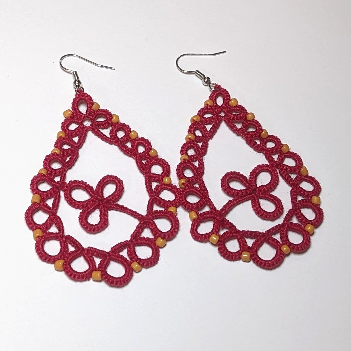 Red Yellow Gold Clover Drop Earrings on white background