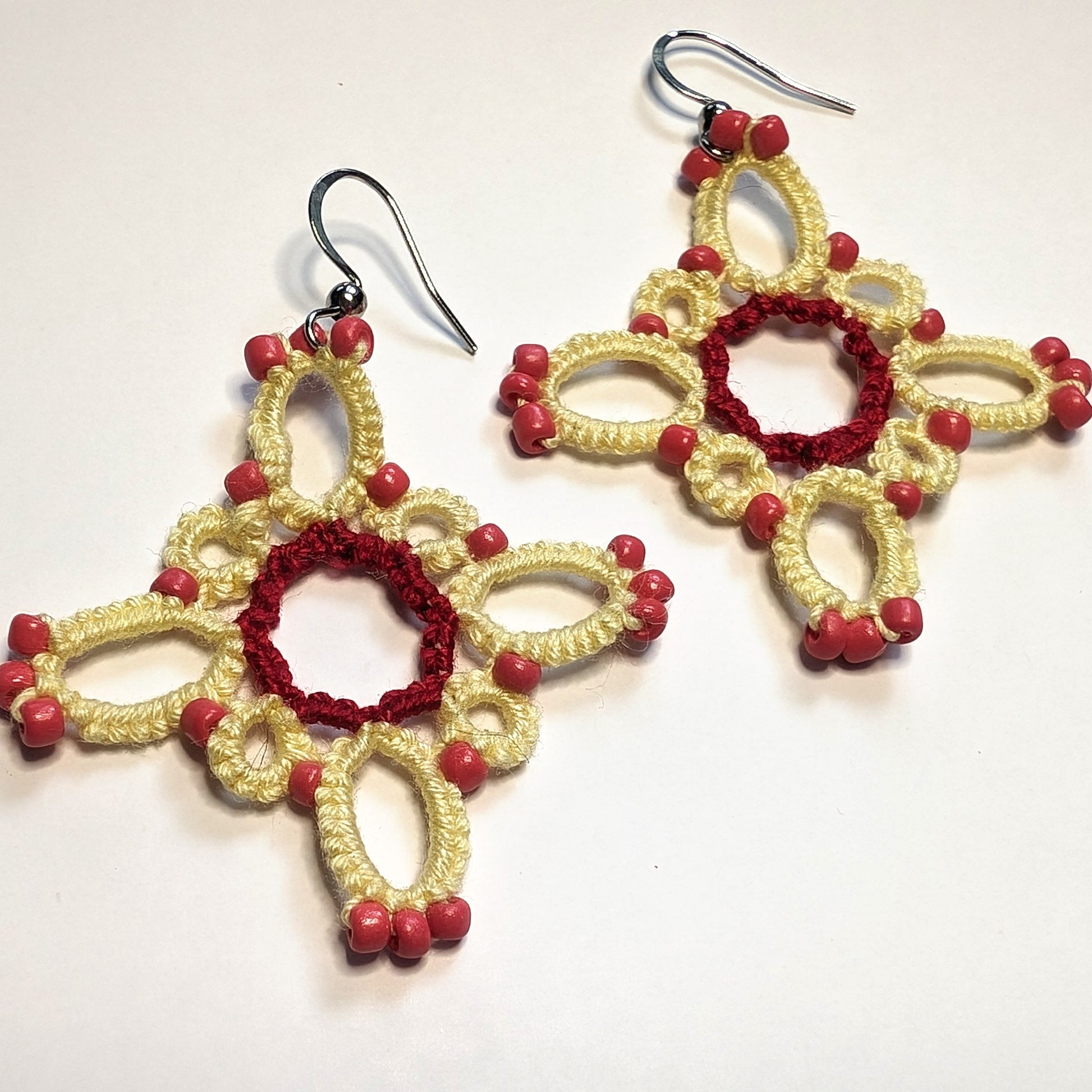 Yellow, Red, Coral Starburst Earrings on White Background